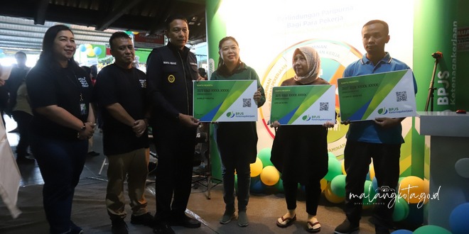 Penjabat (Pj.) Wali Kota Malang, Dr. Ir. Wahyu Hidayat, MM, dengan bangga meresmikan Program Pasar Sadar BPJS Ketenagakerjaan di Pasar Oro-Oro Dowo pada Kamis (25/7). Foto: Pemkot Malang